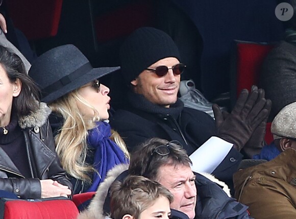 Arnaud Lemaire et Carine Galli lors de la victoire du PSG face à Evian Thonon Gaillard au Parc des Princes à Paris le 18 janvier 2015