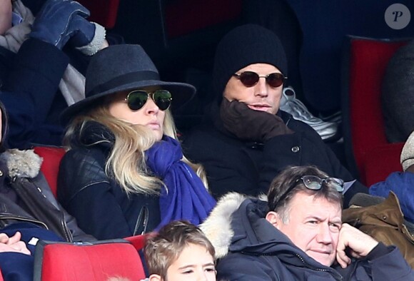 Arnaud Lemaire et Carine Galli lors de la victoire du PSG face à Evian Thonon Gaillard au Parc des Princes à Paris le 18 janvier 2015