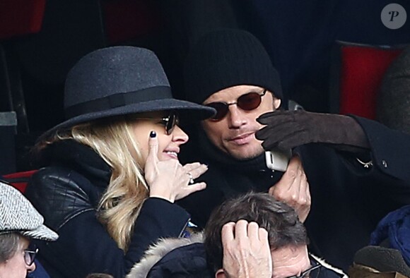 Arnaud Lemaire et Carine Galli lors de la victoire du PSG face à Evian Thonon Gaillard au Parc des Princes à Paris le 18 janvier 2015