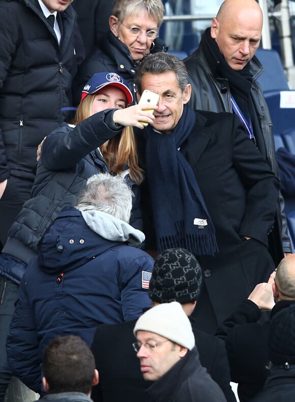 Nicolas Sarkozy lors de la victoire du PSG face à Evian Thonon Gaillard au Parc des Princes à Paris le 18 janvier 2015