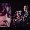 Crosby, Stills & Nash accompagnés par Dallas Taylor à la batterie sur la scène du festival Woodstock en 1969.