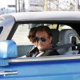 Johnny Hallyday et sa femme Laeticia à bord de leur Rolls-Royce. Le couple est allé avec des amis, à Los Angeles le 22 janvier 2015.