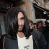 Conchita Wurst quitte le défilé Jean Paul Gaultier, collection haute couture printemps-été 2015 à Paris le 28 janvier 2015.
