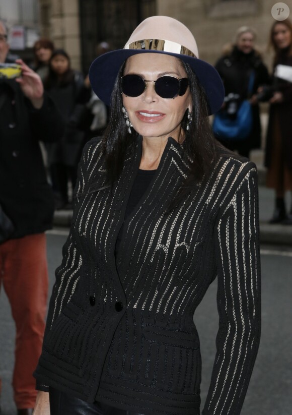 Mouna Ayoub arrive au défilé Jean Paul Gaultier, collection haute couture printemps-été 2015 à Paris le 28 janvier 2015.