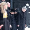 La reine Sonja, la princesse Märtha-Louise de Norvège et son mari Ari Behn aux obsèques de Johan Martin Ferner, le 2 février 2015 en la chapelle d'Holmenkollen, en périphérie d'Oslo.