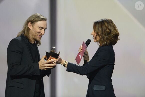 David Guetta et Virginie Guilhaume - Soirée des 30e Victoires de la Musique au Zénith de Paris, le 13 février 2015.