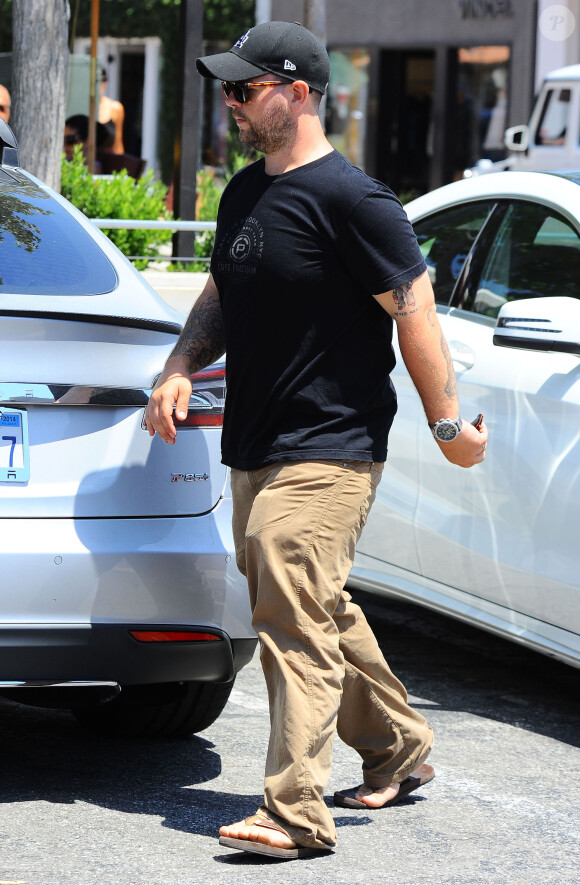 Jack Osbourne et sa femme Lisa Stelly vont déjeuner avec leur fille Pearl à Malibu, le 29 juin 2014. 