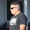 Ronaldo et ses kilos en trop chez Fred Segal avec des amis à West Hollywood, le 10 février 2015