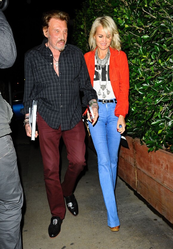 Johnny Hallyday et sa femme Laeticia sont allés dîner avec des amis au restaurant "Giorgio Baldi" à Santa Monica, le 25 février 2015.