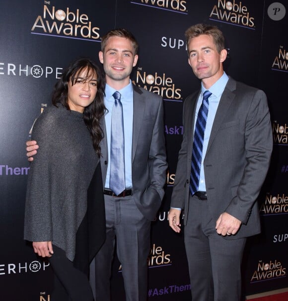 Michelle Rodriguez, Cody Walker, Caleb Walker lors des Noble Awards à Beverly Hills le 27 février 2015 à Los Angeles