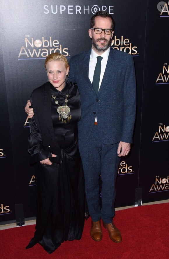 Patricia Arquette, Eric White lors des Noble Awards à Beverly Hills le 27 février 2015 à Los Angeles