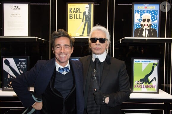 Vincent Darré et Karl Lagerfeld assistent au vernissage de l'exposition "Karlywood" par la dessinatrice Tiffany Cooper dans la boutique Karl Lagerfeld, boulevard Saint-Germain. Paris, le 5 mars 2015.