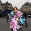 Anna Dello Russo arrive à l'Opéra de Paris pour assister au défilé Stella McCartney automne-hiver 2015-2016. Paris, le 9 mars 2015.