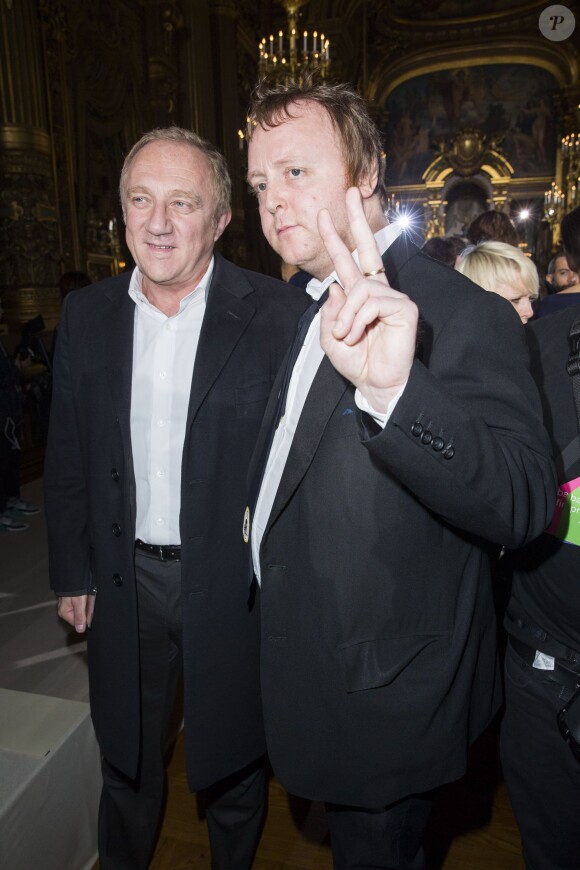 François-Henri Pinault et James McCartney assistent au défilé Stella McCartney automne-hiver 2015-2016 à l'Opéra de Paris. Paris, le 9 mars 2015.