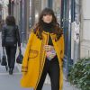 Miroslava Duma arrive à la boutique Sonia Rykiel, dans le quartier de Saint-Germain-des-Près, pour assister au défilé Sonia Rykiel automne-hiver 2015-2016. Paris, le 9 mars 2015.
