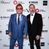 Elton John et son mari David Furnish à la soirée des Oscars de l'Elton John AIDS Foundation à West Hollywood, le 22 février 2015.