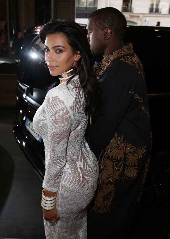 Kanye West et Kim Kardashian au défilé Balmain printemps-été 2015 au Grand Hôtel à Paris le 25 septembre 2014.