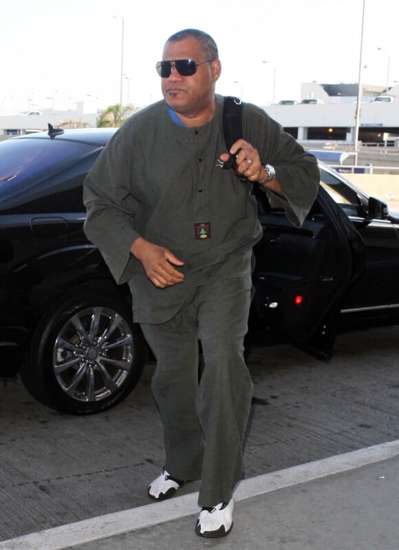 Laurence Fishburne arrive a l'aeroport de Los Angeles, le 3 septembre 2013. 