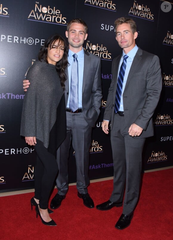 Michelle Rodriguez, Cody Walker, Caleb Walker à Beverly Hills, Los Angeles, le 27 février 2015.