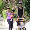Amber Rose et son mari Wiz Khalifa promenent leur fils Sebastian a Los Angeles le 28 janvier 2014. 