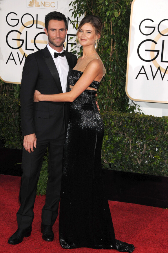 Adam Levine et sa femme Behati Prinsloo à la 72e cérémonie annuelle des Golden Globe Awards à Beverly Hills. Le 11 janvier 2015 
