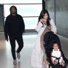 Kanye West, Kim Kardashian et leur fille North arrivent à l'aéroport de Roissy-Charles-de-Gaulle. Roissy, le 14 avril 2015.