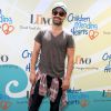 Jesse Bradford - Soirée de charité "Empathy Rocks: A spring into Summer Bash" organisée par "The Children Mending Hearts" à Beverly Hills, le 14 juin 2014.  