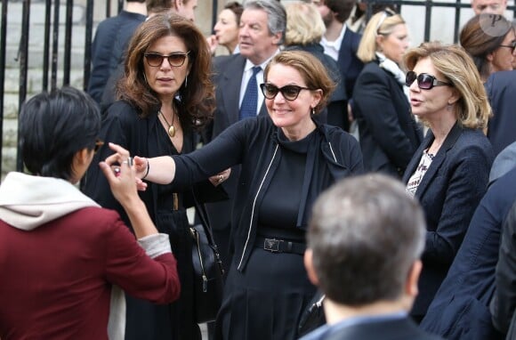 Béatrice Schönberg et Cendrine Dominguez - Sorties des obsèques de Patrice Dominguez en la basilique Sainte Clotilde à Paris. Le 16 avril 2015 