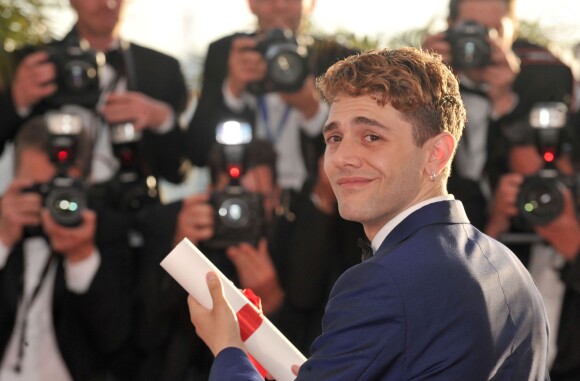 Xavier Dolan (Prix du jury pour "Mommy") - Photocall de la remise des palmes du 67e Festival du film de Cannes le 24 mai 2014.