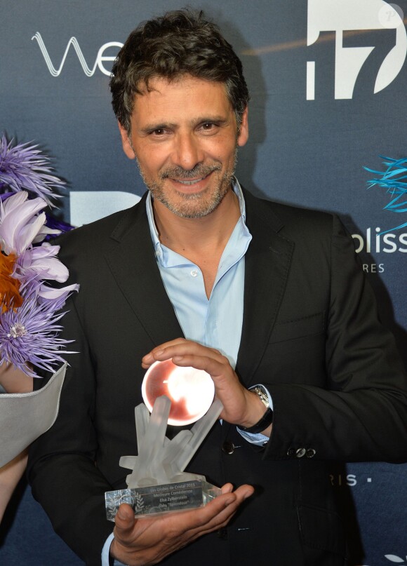 Pascal Elbé - Photocall de la remise des trophées lors de la 10ème cérémonie des Globes de Cristal au Lido à Paris, le 13 avril 2015.