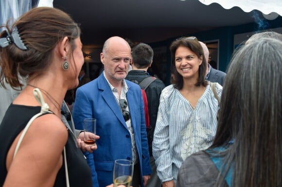 Exclusif - Jean Paul Salomé et Isabelle Giordano lors du cocktail UniFrance à Cannes. Le 14 mai 2015.