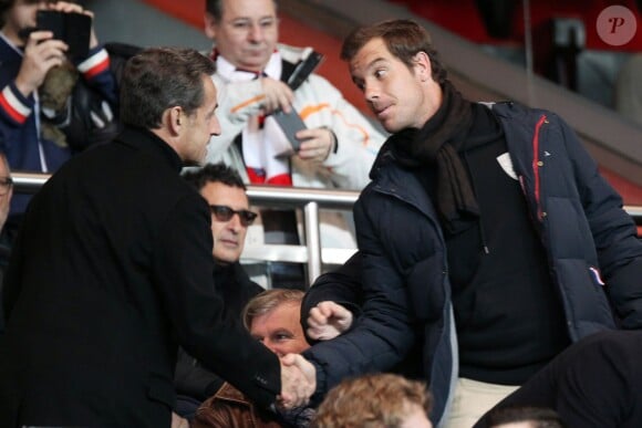 Nicolas Sarkozy avec Richard Gasquet lors de la rencontre entre le PSG et Nantes au Parc des Princes à Paris le 19 janvier 2014