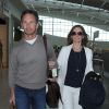Les jeunes mariés Geri Halliwell et Christian Horner arrivent à l'aéroport de Heathrow, le 16 mai 2015 pour prendre un vol pour Nice.