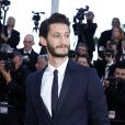 Pierre Niney - Montée des marches du film "Inside Out" (Vice-Versa) lors du 68e Festival International du Film de Cannes, le 18 mai 2015.