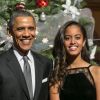Barack Obama, Michelle Obama, Sasha et Malia, à Washington, le 14 décembre 2014