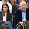 Patrick Poivre d'Arvor et une amie - People dans les tribunes lors du tournoi de tennis de Roland Garros à Paris le 29 mai 2015.