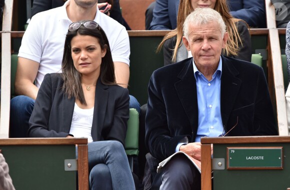 Patrick Poivre d'Arvor et une amie - People dans les tribunes lors du tournoi de tennis de Roland Garros à Paris le 29 mai 2015.