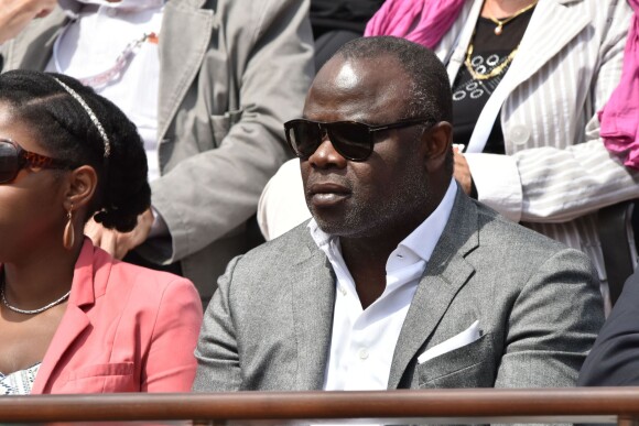 Basile Boli - People dans les tribunes lors du tournoi de tennis de Roland Garros à Paris le 29 mai 2015.