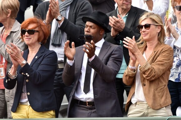 Sylvain Wiltord et Michèle Laroque - People dans les tribunes lors du tournoi de tennis de Roland Garros à Paris le 29 mai 2015.