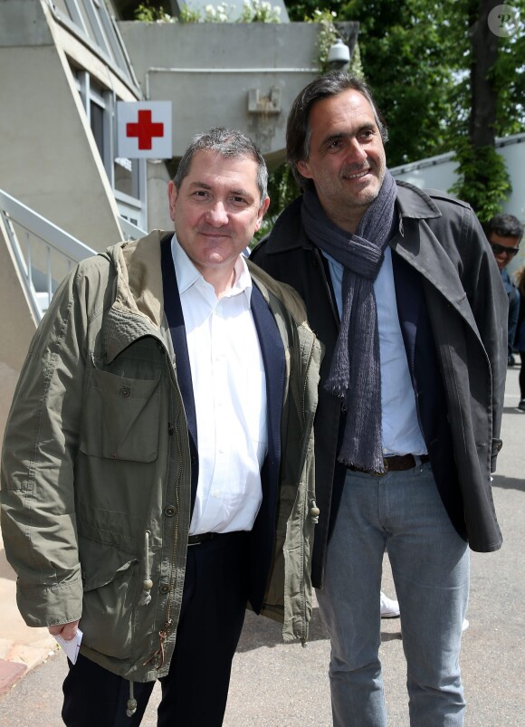 Yves Calvi et Emmanuel Chain - People au village des Internationaux de France de tennis de Roland Garros à Paris le 29 mai 2015. 
