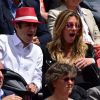 Sophie Thalmann et son mari Christophe Soumillon dans les tribunes des Internationaux de France de tennis de Roland-Garros à Paris, le 1er juin 2015.