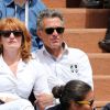 Gérard Holtz et sa femme Muriel Mayette-Holtz dans les tribunes des Internationaux de France de tennis de Roland-Garros à Paris, le 1er juin 2015.