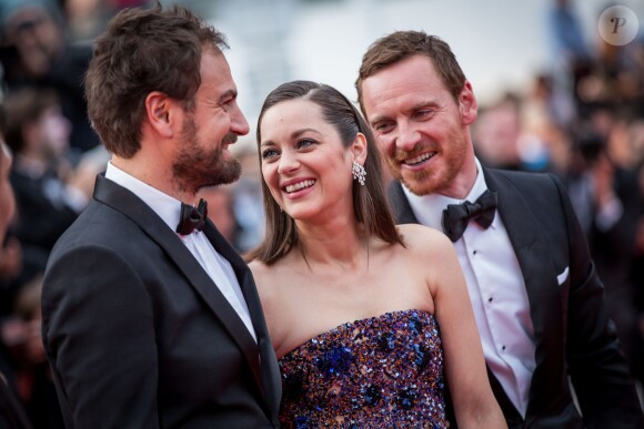 Justin Kurzel, Marion Cotillard et Michael Fassbender - Montée des marches du film "Macbeth" lors du 68e Festival International du Film de Cannes, le 23 mai 2015.