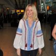  Ellie Goulding et son compagnon Dougie Poynter arrivent &agrave; l'a&eacute;roport Heathrow de Londres, pour prendre un avion pour Los Angeles. Le 1er juin 2015  