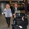 Ellie Goulding et son compagnon Dougie Poynter arrivent à l'aéroport Heathrow de Londres, pour prendre un avion pour Los Angeles. Le 1er juin 2015 
