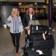  Ellie Goulding et son compagnon Dougie Poynter arrivent &agrave; l'a&eacute;roport Heathrow de Londres, pour prendre un avion pour Los Angeles. Le 1er juin 2015  