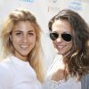 La chanteuse Joyy et Lorie, lors de la troisième journée du Trophée des personnalités à Roland-Garros, le jeudi 4 juin 2015.