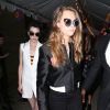 Cara Delevingne et sa petite amie St. Vincent arrivent à la garden-party de présentation de la collection croisière 2016 de Stella McCartney au parc Elizabeth Street Garden. New York, le 8 juin 2015.