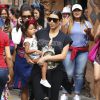Kim Kardashian, enceinte, et sa fille North assistent à l'anniversaire de Penelope Disick (3 ans) au parc d'attractions Disneyland. Anaheim, le 8 juillet 2015.