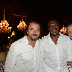 Exclusif - Henri Leconte, Marcel Desailly, Ilie Nastase - 20e édition de la soirée Blanche aux Moulins de Ramatuelle à Saint-Tropez le 12 juillet 2015.